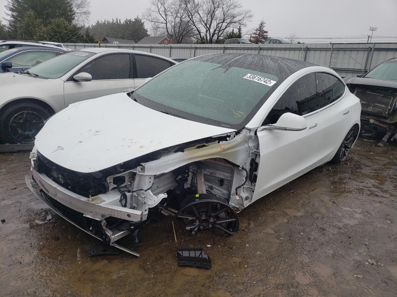 Photo 2 from auction – 2020 TESLA MODEL 3 with VIN 5YJ3E1EA4LF737018