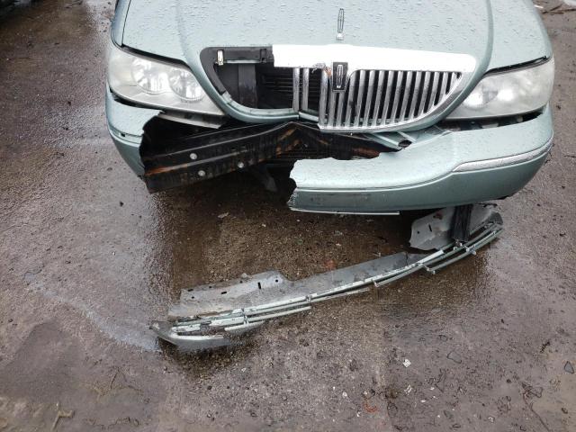 Photo 9 from auction – 2004 LINCOLN TOWN CAR E with VIN 1LNHM81W34Y675000