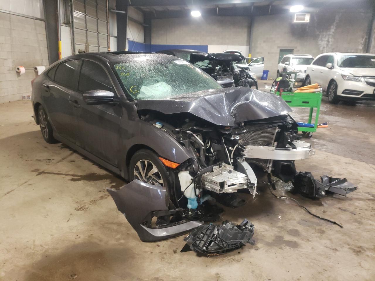 HONDA CIVIC EX 2017 with VIN 2HGFC2F70HH574480 - Photo from auction