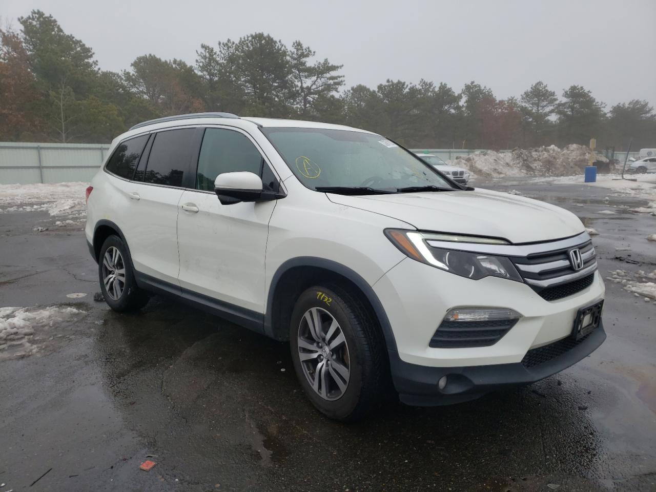 HONDA PILOT EXL 2016 with VIN 5FNYF6H88GB005201 - Photo from auction