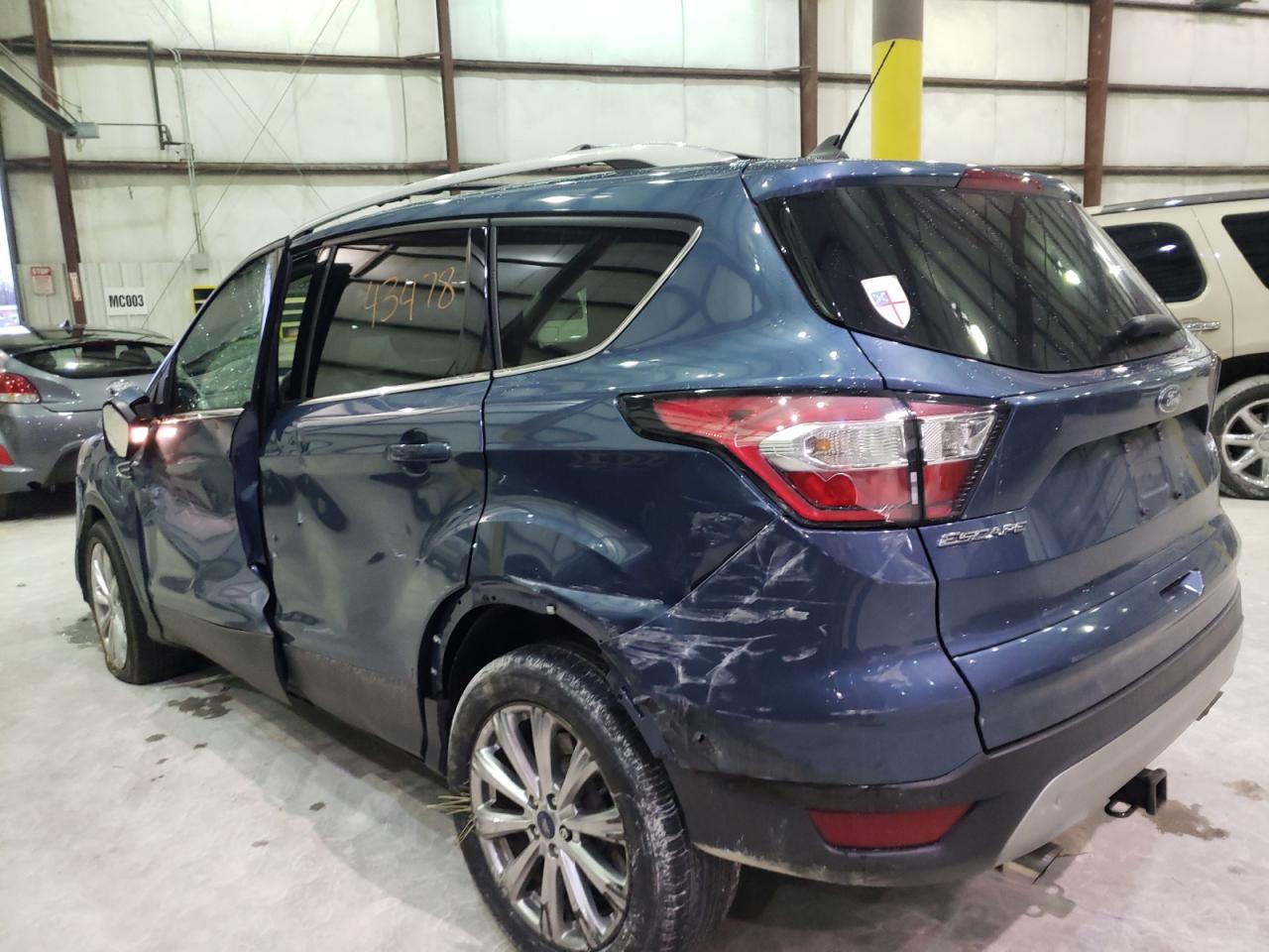 Photo 9 from auction – 2018 FORD ESCAPE TIT with VIN 1FMCU0J91JUC85182
