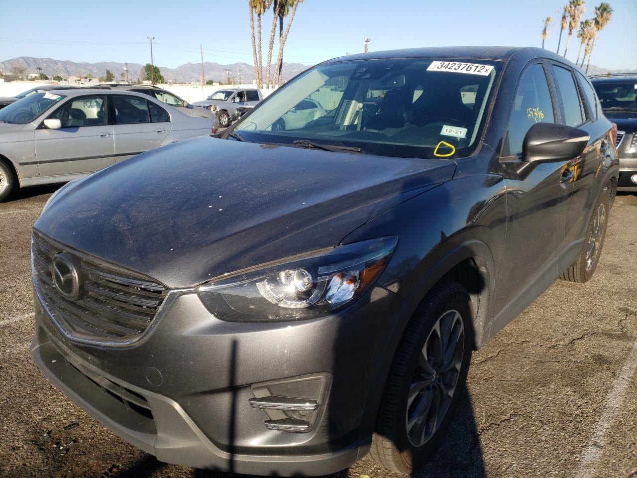 Photo 2 from auction – 2016 MAZDA CX-5 GT with VIN JM3KE2DY0G0839413