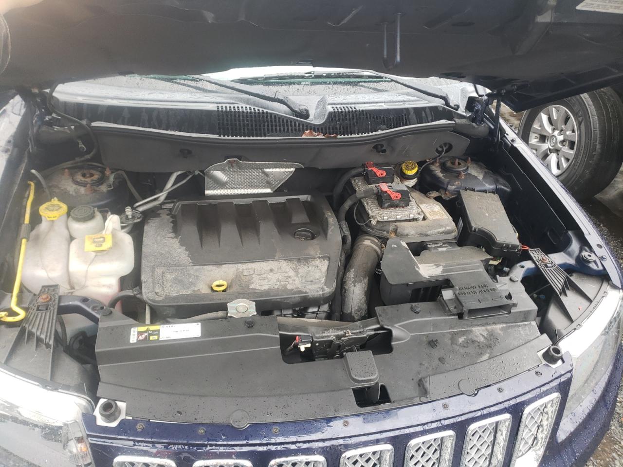 Photo 7 from auction – 2014 JEEP COMPASS LA with VIN 1C4NJDEBXED620195