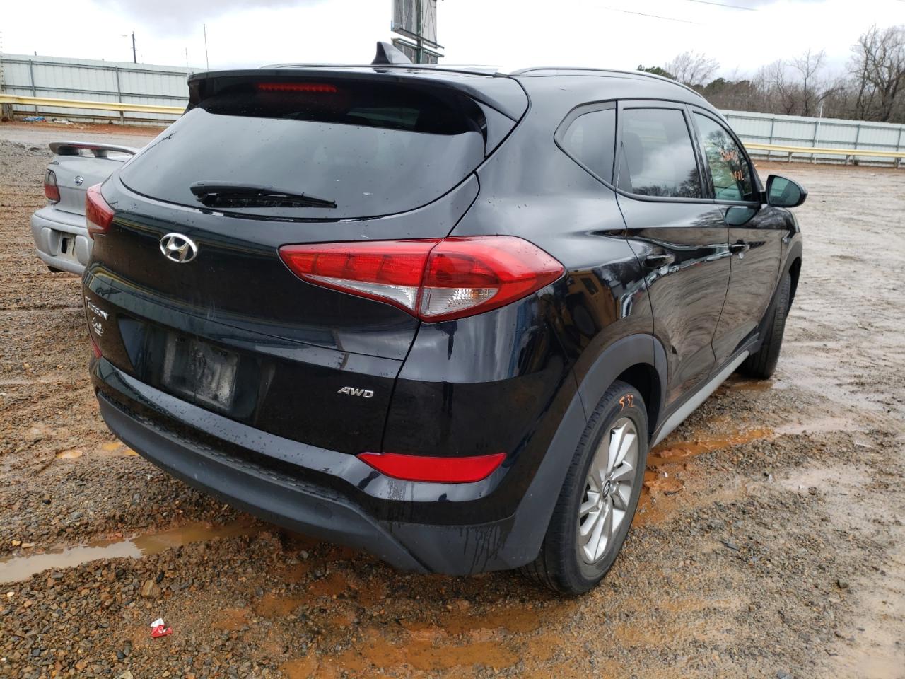Photo 4 from auction – 2018 HYUNDAI TUCSON SEL with VIN KM8J3CA45JU612263