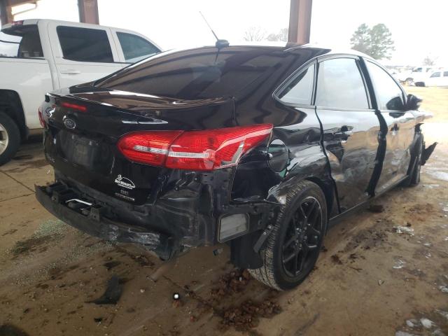 Photo 4 from auction – 2016 FORD FOCUS SE with VIN 1FADP3F24GL273920