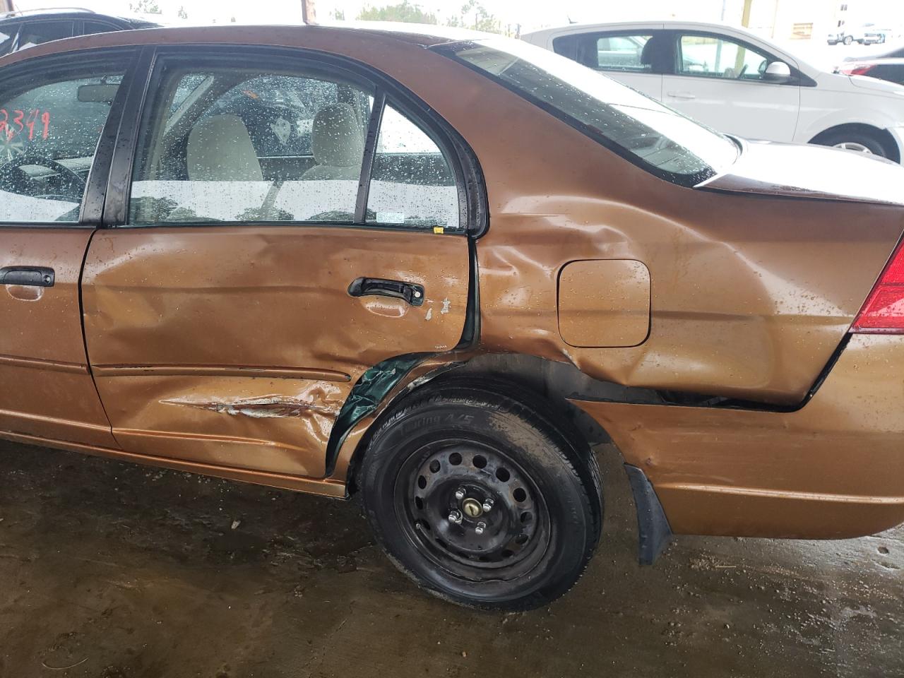 Photo 9 from auction – 2001 HONDA CIVIC LX with VIN 1HGES16581L024329