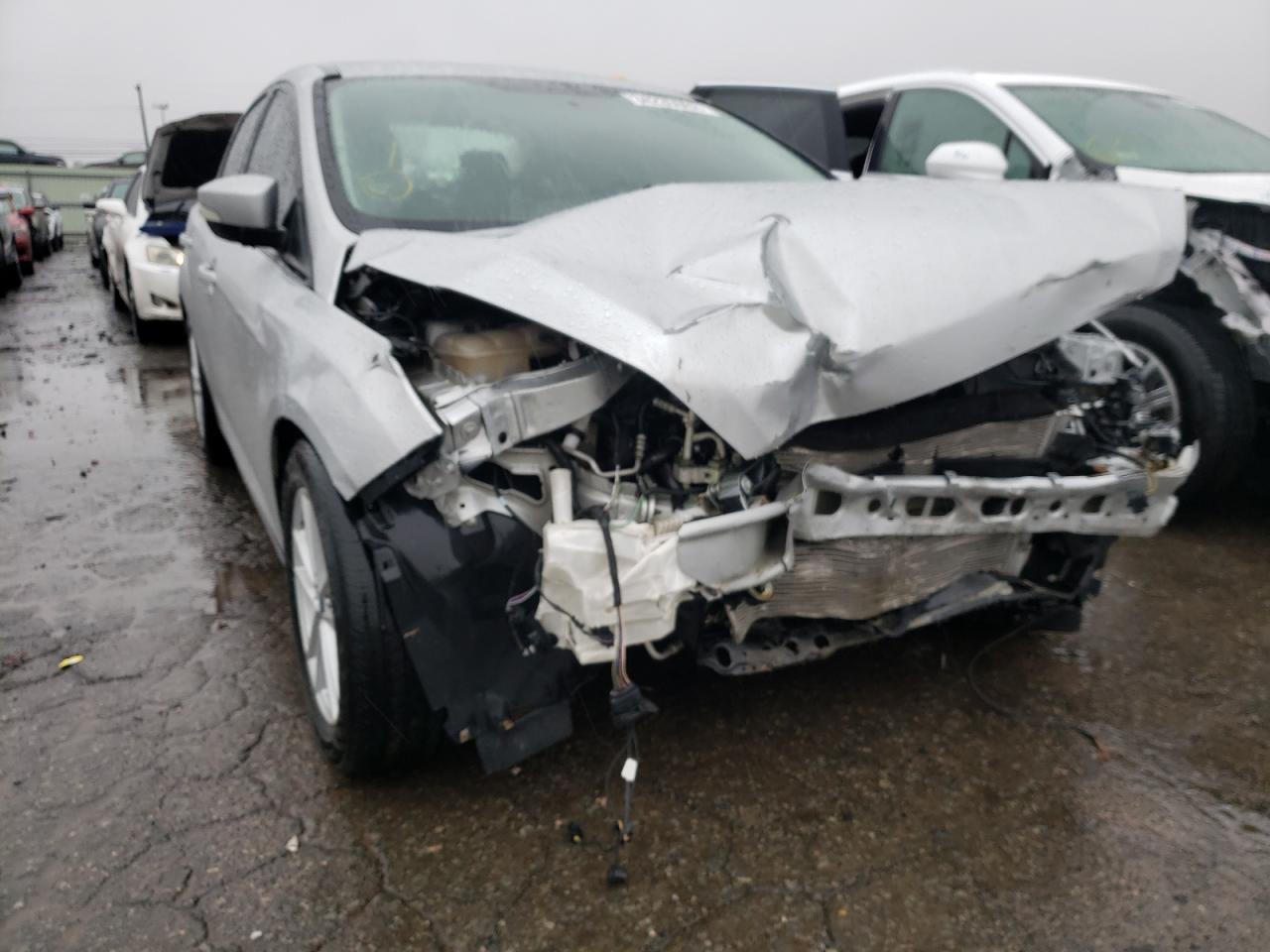 Foto 9 de la subasta – 2018 FORD FOCUS SE con VIN 1FADP3F28JL248557