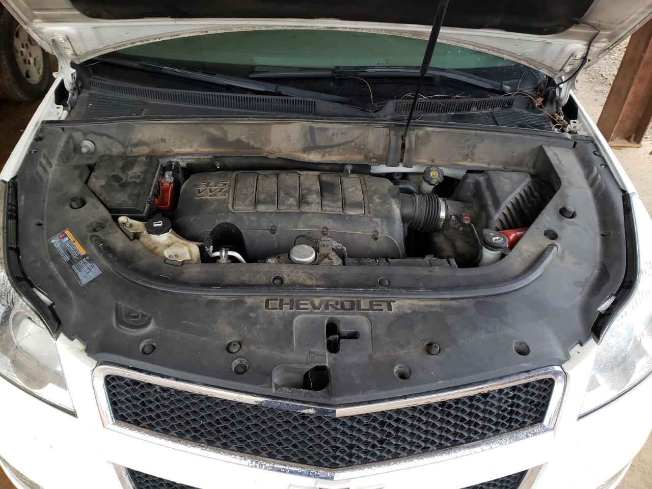 Photo 7 from auction – 2012 CHEVROLET TRAVERSE L with VIN 1GNKRFED1CJ216930
