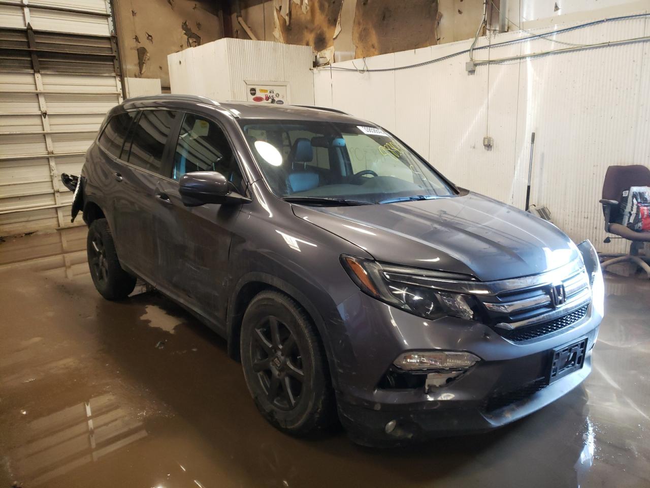 HONDA PILOT EXL 2017 with VIN 5FNYF6H58HB017890 - Photo from auction