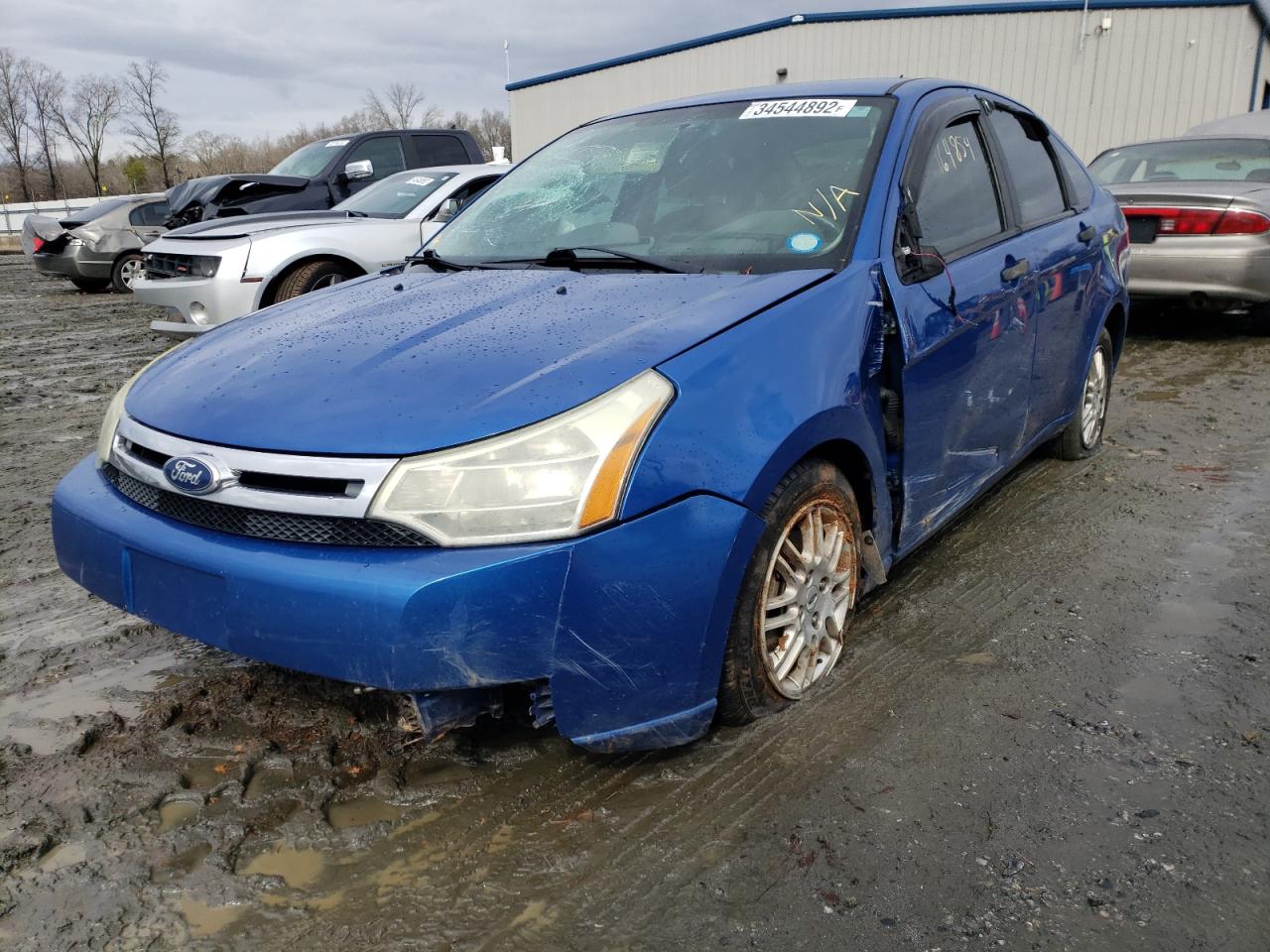 Foto 2 de la subasta – 2011 FORD FOCUS SE con VIN 1FAHP3FN7BW159588