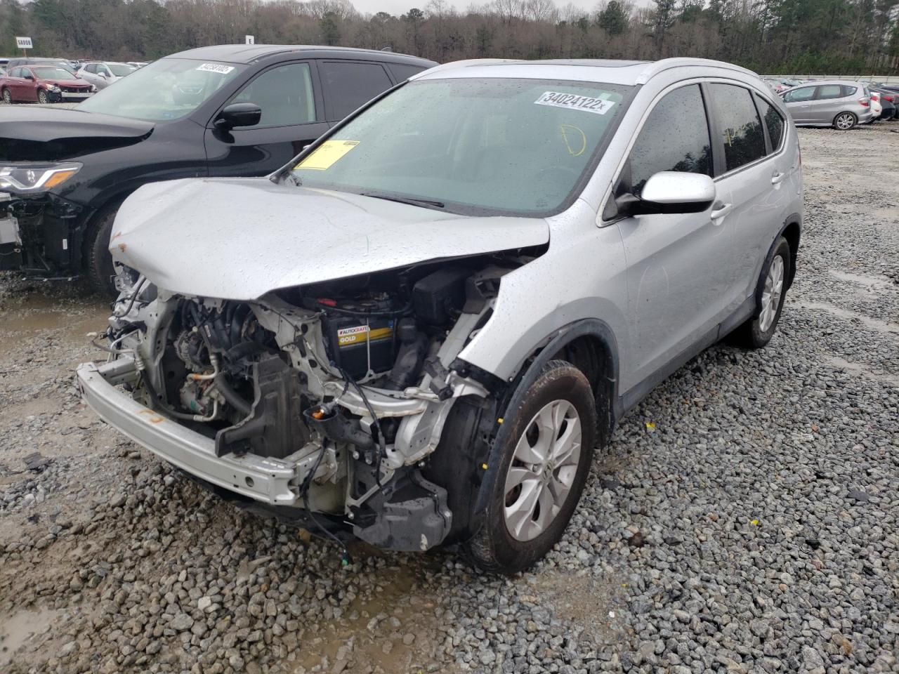 Photo 2 from auction – 2014 HONDA CR-V EXL with VIN 2HKRM3H71EH565494