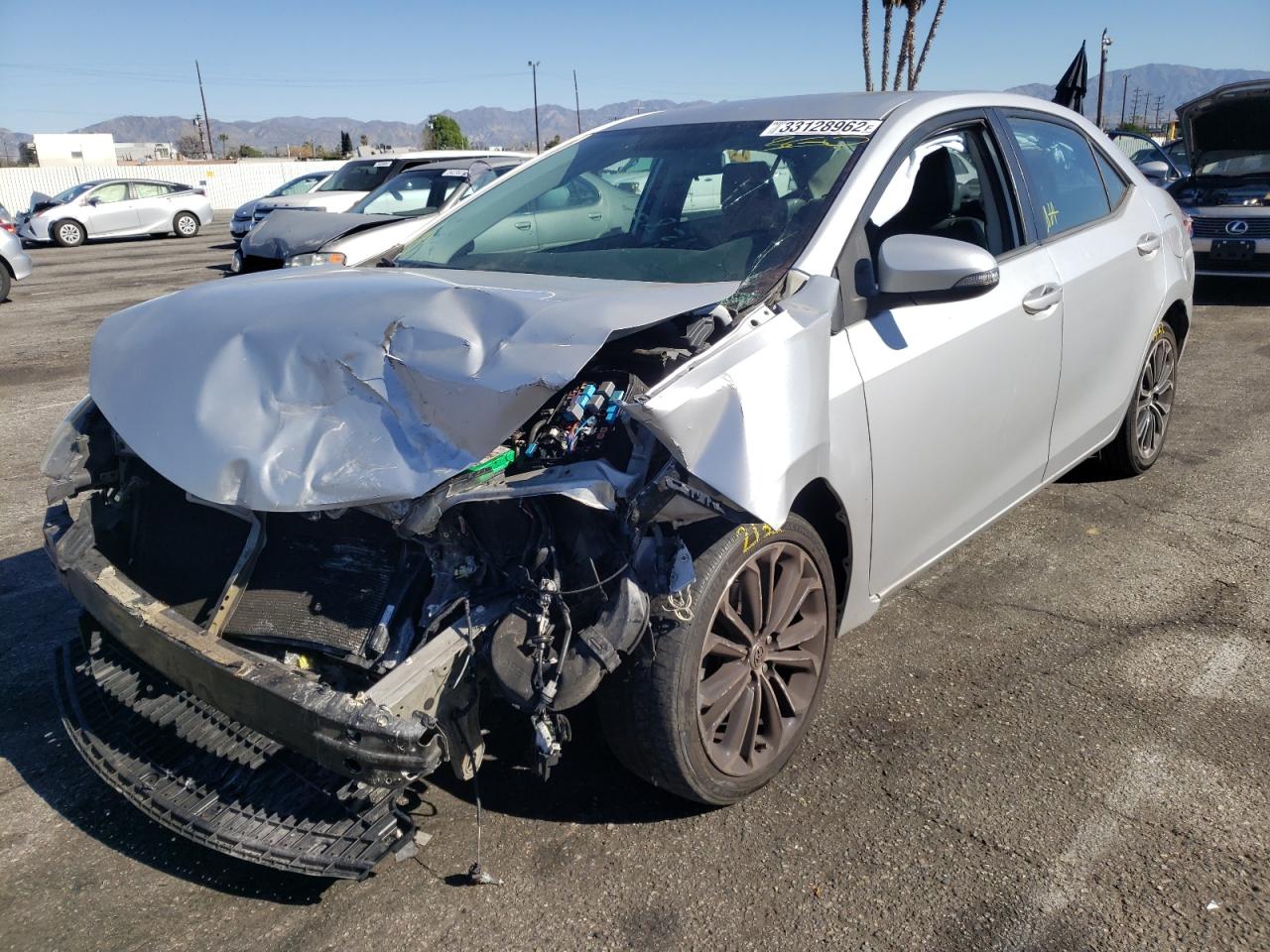 Photo 2 from auction – 2014 TOYOTA COROLLA L with VIN 5YFBURHE4EP023098