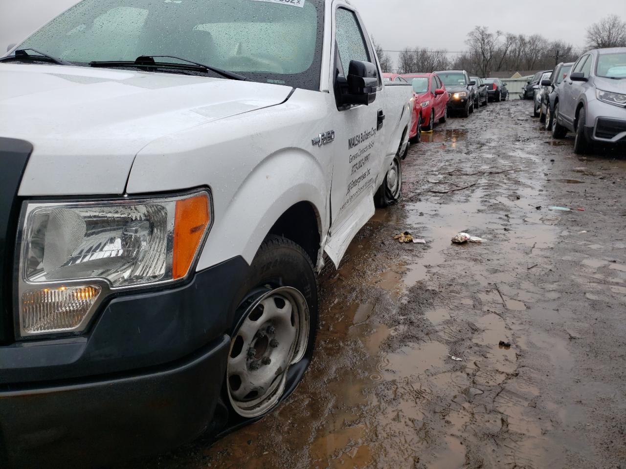 Photo 9 from auction – 2014 FORD F150 with VIN 1FTMF1CM1EKF28789