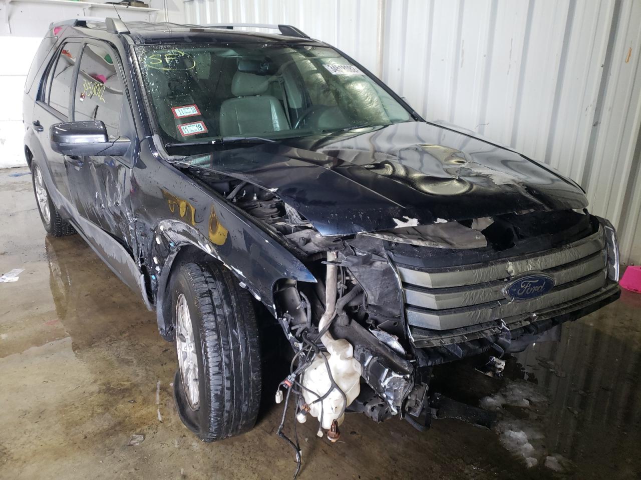 FORD TAURUS X S 2008 with VIN 1FMDK05W98GA05186 - Photo from auction