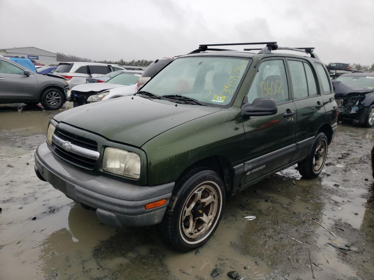 Photo 2 from auction – 2000 CHEVROLET TRACKER with VIN 2CNBJ13C0Y6922736