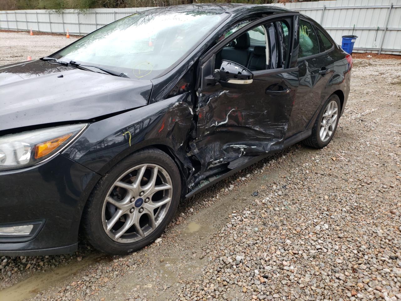 Photo 9 from auction – 2015 FORD FOCUS SE with VIN 1FADP3F20FL322416
