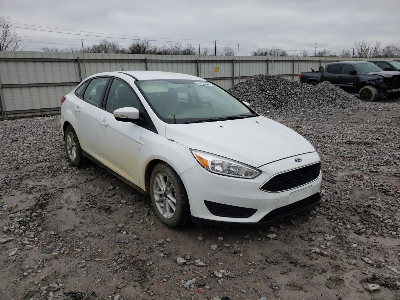 FORD FOCUS SE 2017 with VIN 1FADP3F24HL225724 - Photo from auction