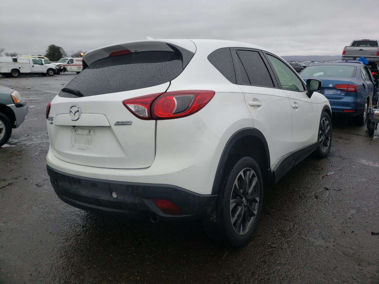 Photo 4 from auction – 2016 MAZDA CX-5 GT with VIN JM3KE4DY2G0881576