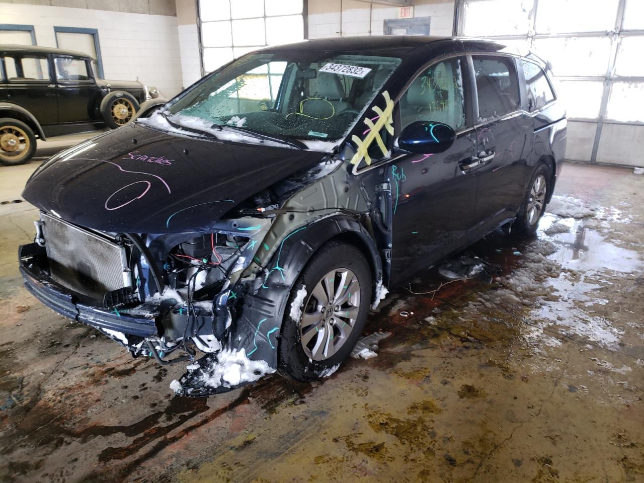 Photo 2 from auction – 2015 HONDA ODYSSEY EX with VIN 5FNRL5H41FB063623