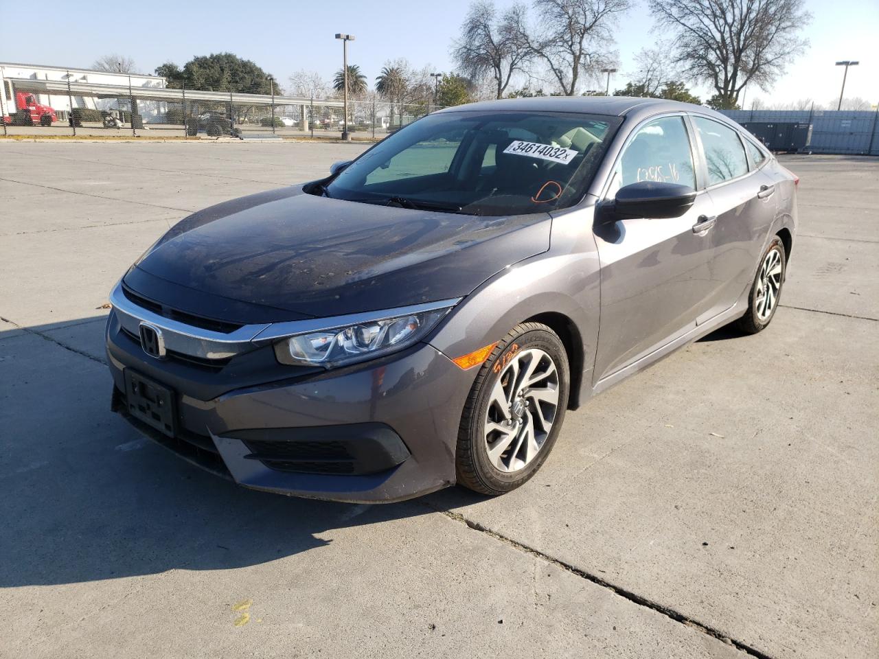 Photo 2 from auction – 2016 HONDA CIVIC EX with VIN 2HGFC2F71GH566046