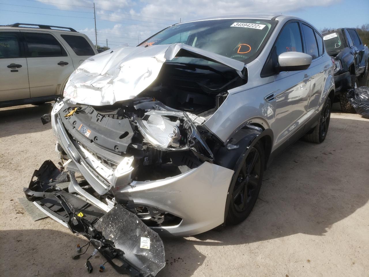 Photo 2 from auction – 2016 FORD ESCAPE SE with VIN 1FMCU0G7XGUB03882