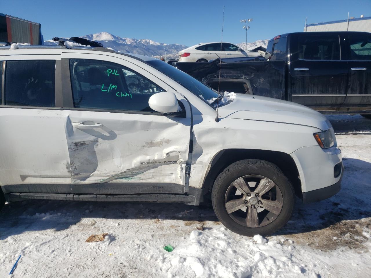 Photo 9 from auction – 2014 JEEP COMPASS LA with VIN 1C4NJCEA1ED568375