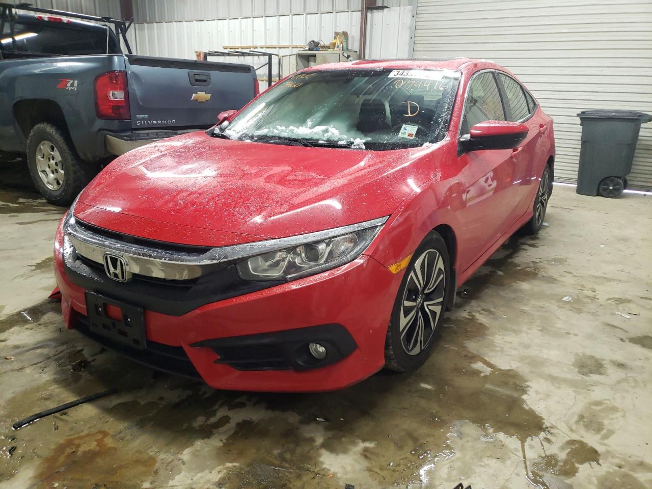 Photo 2 from auction – 2018 HONDA CIVIC EX with VIN JHMFC1F31JX034416