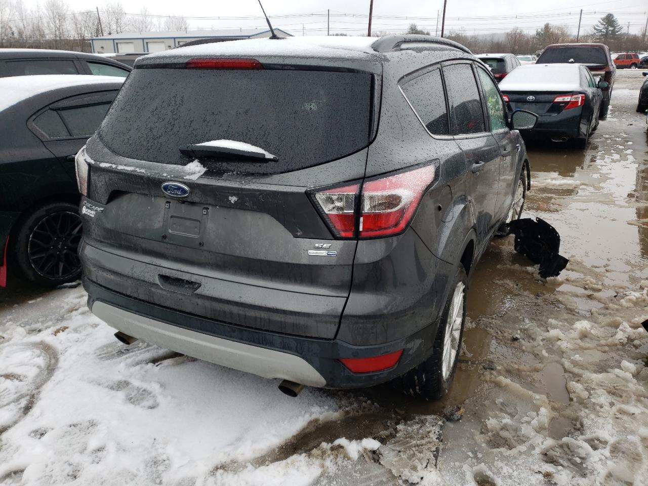 Photo 4 from auction – 2017 FORD ESCAPE SE with VIN 1FMCU9GD6HUC28552