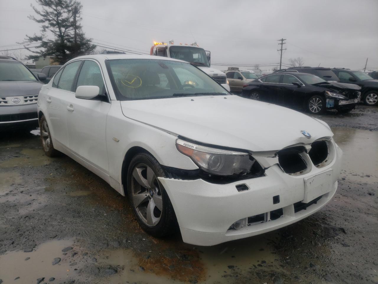 BMW 525 I 2007 with VIN WBANE53537CK92812 - Photo from auction