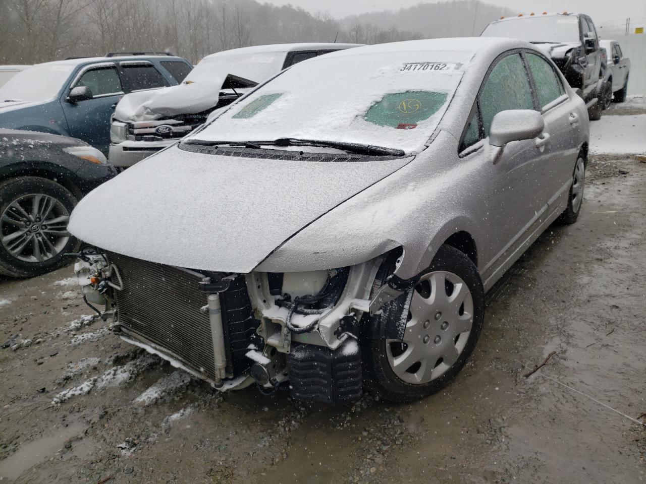 Photo 2 from auction – 2011 HONDA CIVIC LX with VIN 2HGFA1F58BH309263