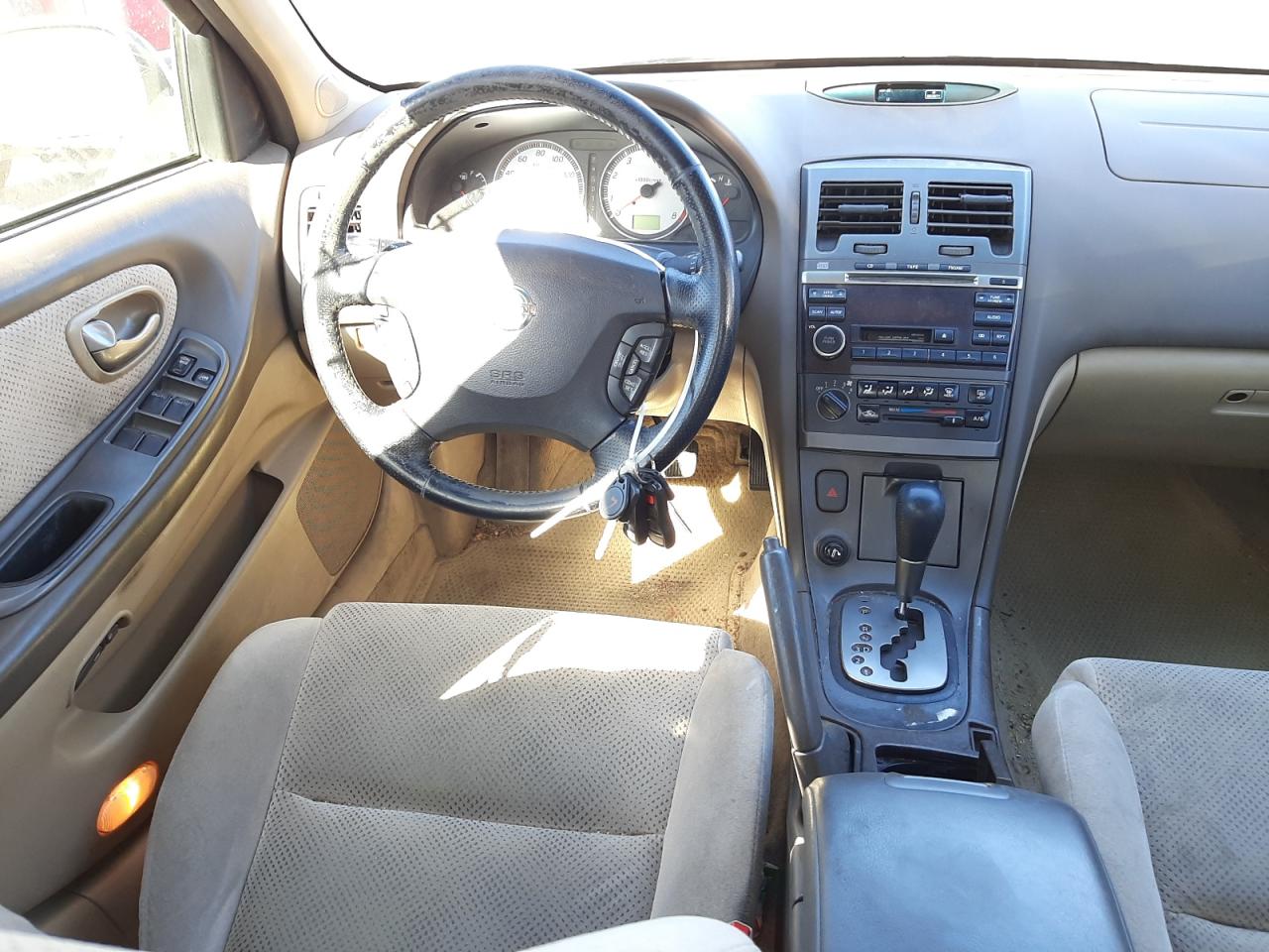 Photo 9 from auction – 2002 NISSAN MAXIMA GLE with VIN JN1DA31D12T417956