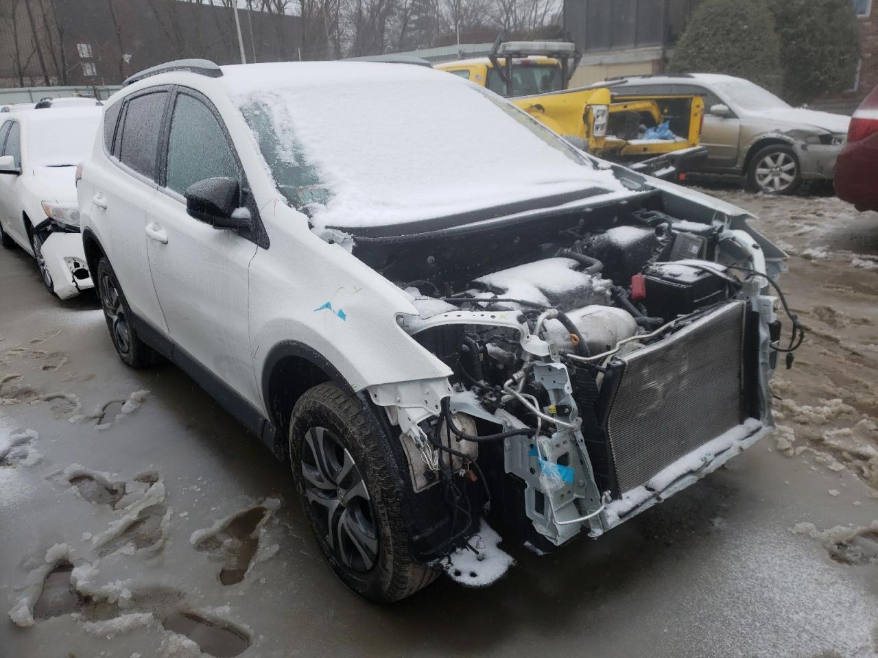 TOYOTA RAV4 LE 2018 with VIN 2T3BFREV5JW854432 - Photo from auction