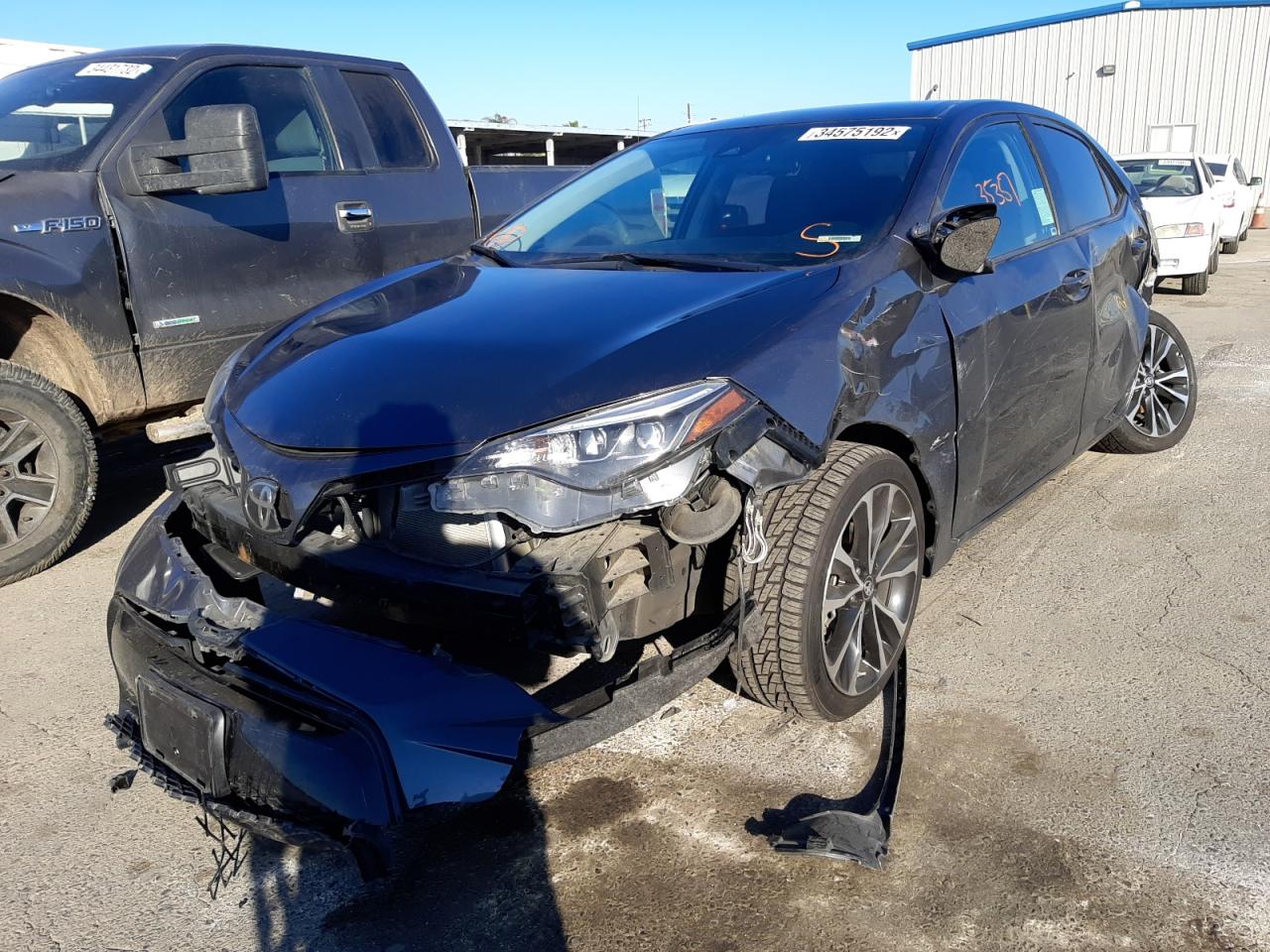Photo 2 from auction – 2018 TOYOTA COROLLA L with VIN 2T1BURHE9JC093481