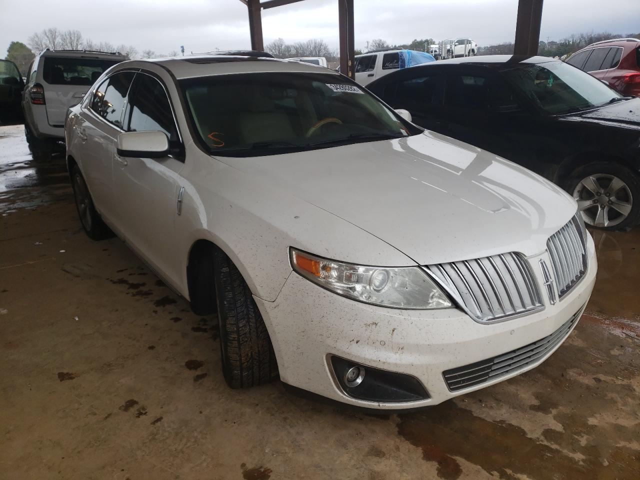 LINCOLN MKS 2011 with VIN 1LNHL9DR9BG603851 - Photo from auction