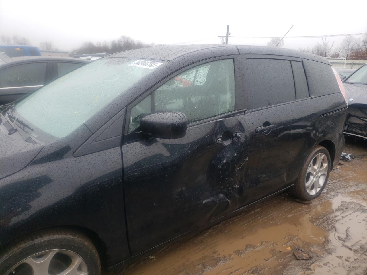 Photo 9 from auction – 2010 MAZDA 5 with VIN JM1CR2WL2A0385594