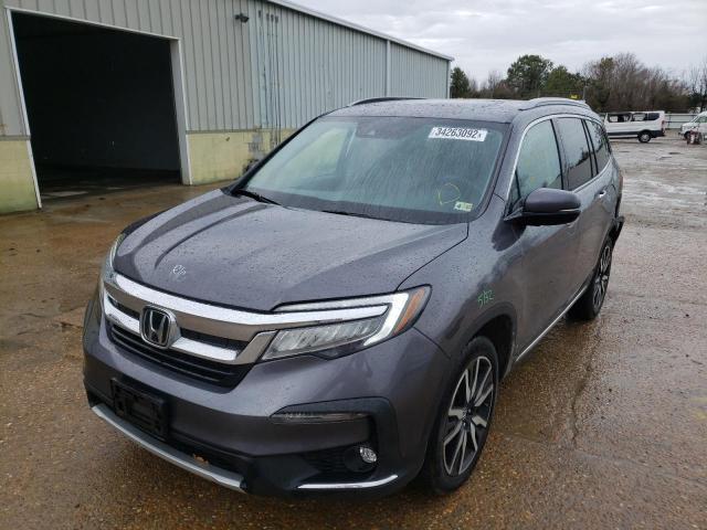 Photo 2 from auction – 2021 HONDA PILOT TOUR with VIN 5FNYF6H60MB053172