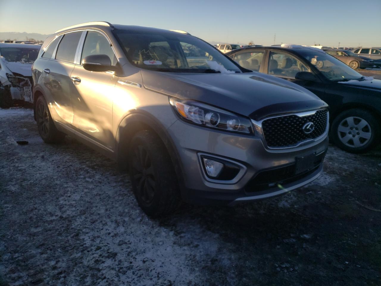 KIA SORENTO EX 2016 with VIN 5XYPHDA19GG037123 - Photo from auction