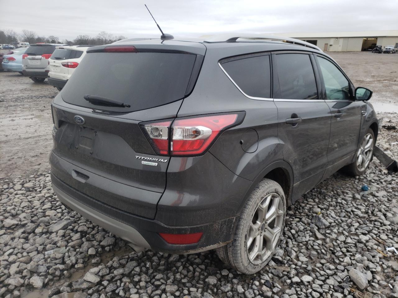 Photo 4 from auction – 2017 FORD ESCAPE TIT with VIN 1FMCU0J98HUE29465