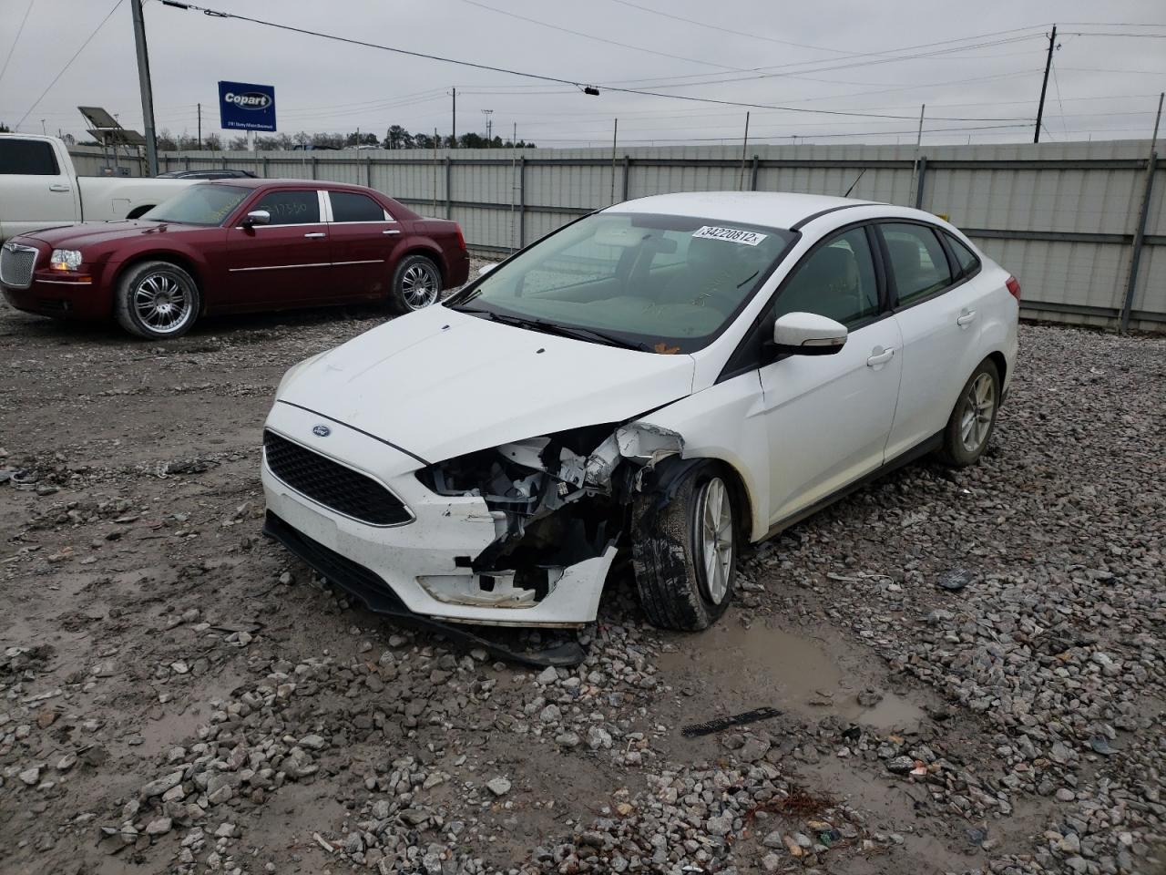 Фото 2 с аукциона – 2017 FORD FOCUS SE с VIN 1FADP3F24HL225724