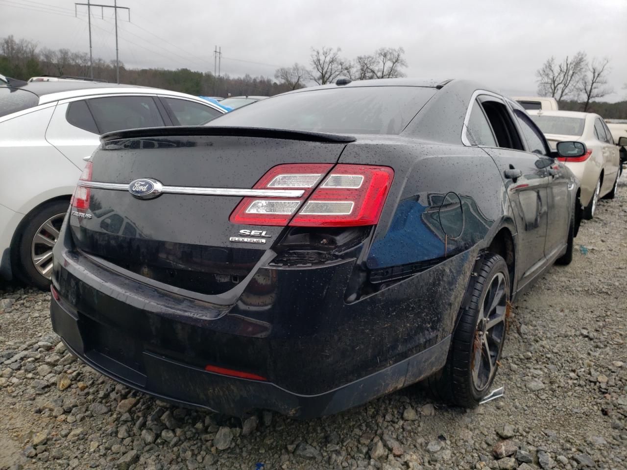 Photo 4 from auction – 2015 FORD TAURUS SEL with VIN 1FAHP2E89FG158576