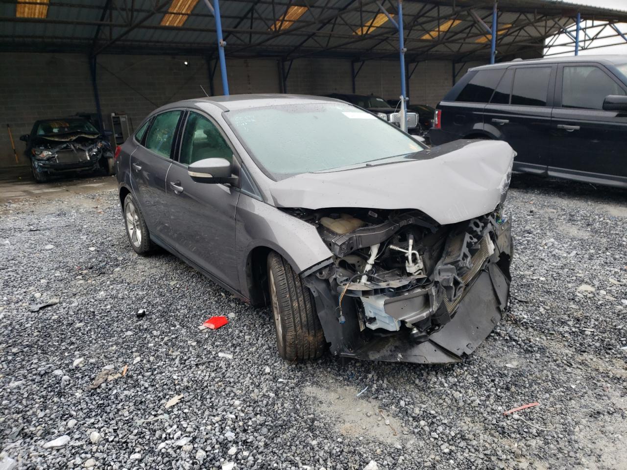 FORD FOCUS SE 2013 with VIN 1FADP3F21DL330957 - Photo from auction