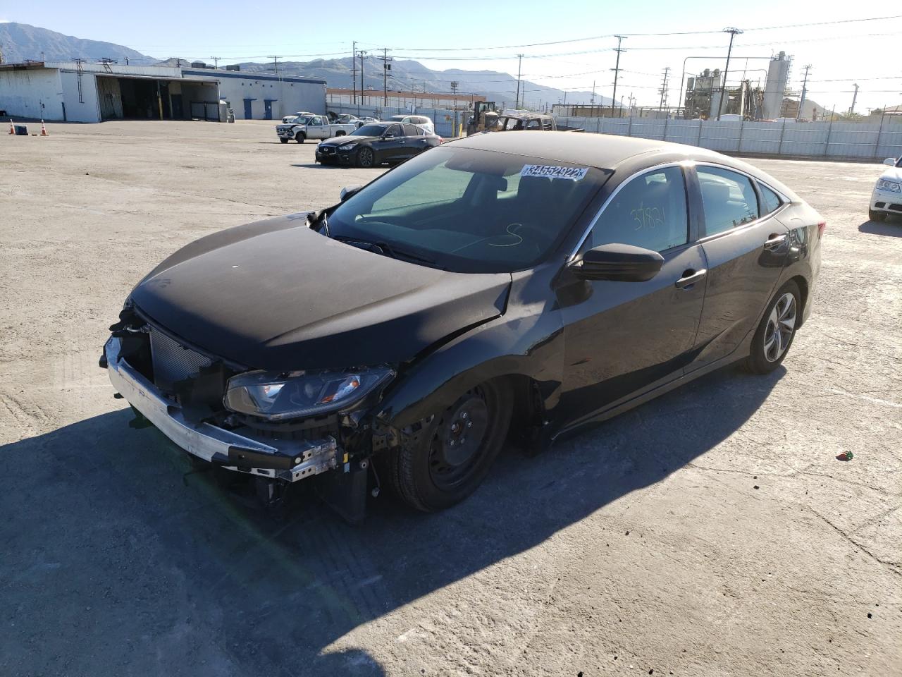 Photo 2 from auction – 2019 HONDA CIVIC LX with VIN 2HGFC2F64KH538533