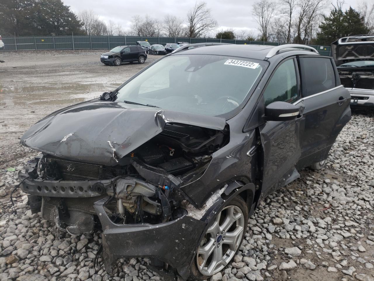 Photo 2 from auction – 2017 FORD ESCAPE TIT with VIN 1FMCU0J98HUE29465