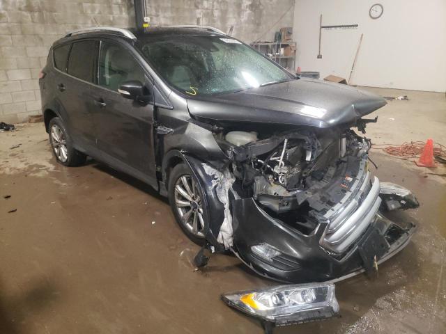 FORD ESCAPE TIT 2017 with VIN 1FMCU9JD7HUC82242 - Photo from auction