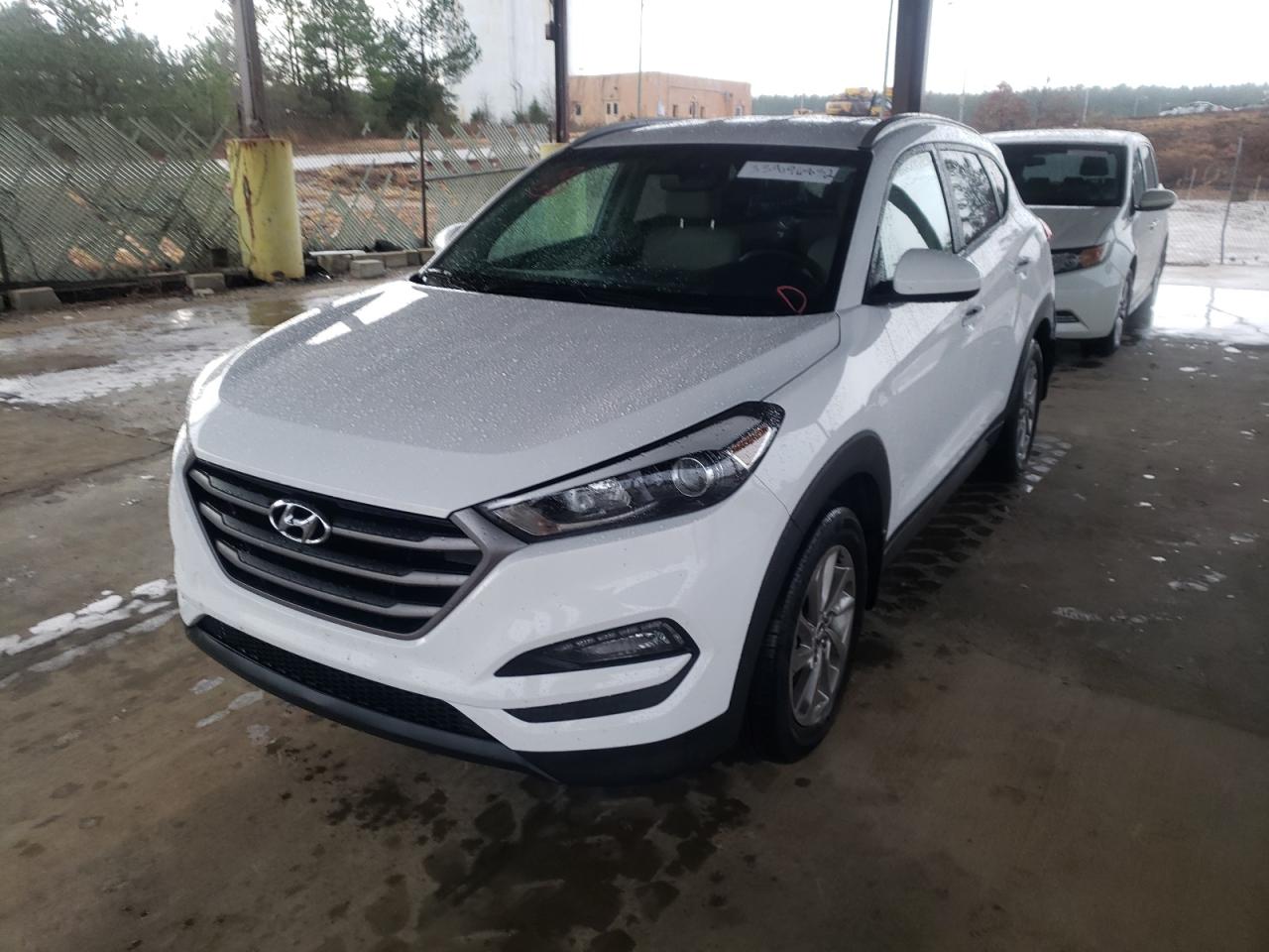Photo 2 from auction – 2016 HYUNDAI TUCSON LIM with VIN KM8J33A40GU126436