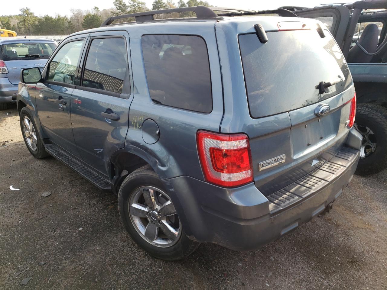 Photo 3 from auction – 2010 FORD ESCAPE XLT with VIN 1FMCU0DG5AKB34965