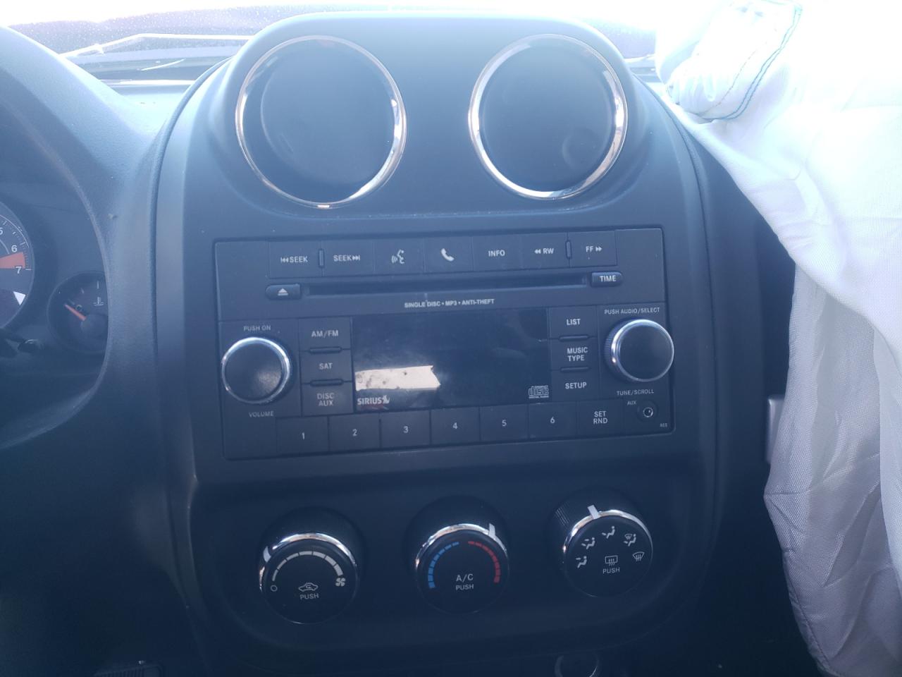 Photo 9 from auction – 2016 JEEP COMPASS SP with VIN 1C4NJDBB0GD509629