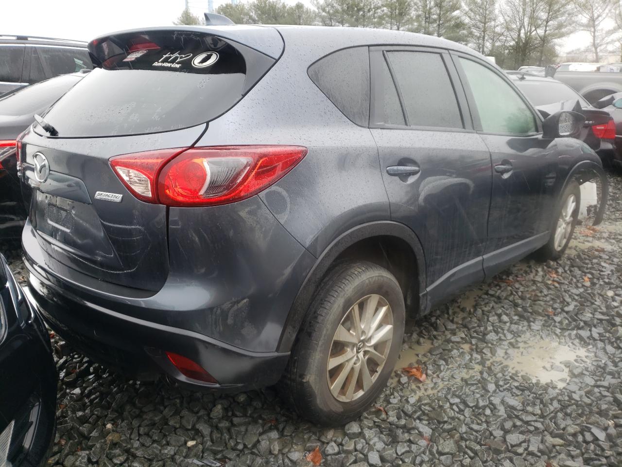 Photo 4 from auction – 2013 MAZDA CX-5 TOURI with VIN JM3KE4CE0D0141740