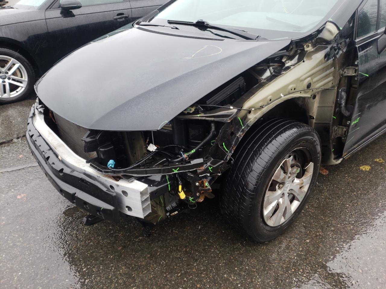 Photo 9 from auction – 2012 HONDA CIVIC LX with VIN 2HGFB2F54CH599280