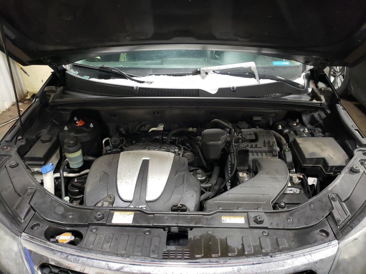 Photo 7 from auction – 2011 KIA SORENTO EX with VIN 5XYKU4A29BG034469